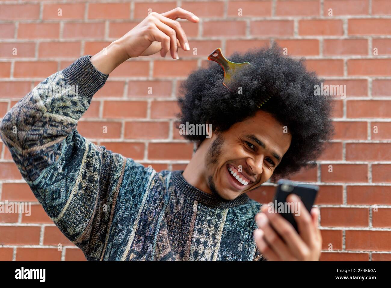 Afro hair comb Banque de photographies et d'images à haute résolution -  Alamy