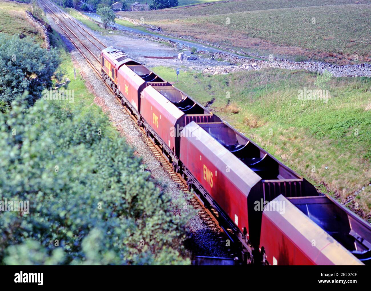 Classe 66 EWS Coal train en direction de AIS Gill, Cumbria, installez-vous à Carlisle Railway, Angleterre Banque D'Images