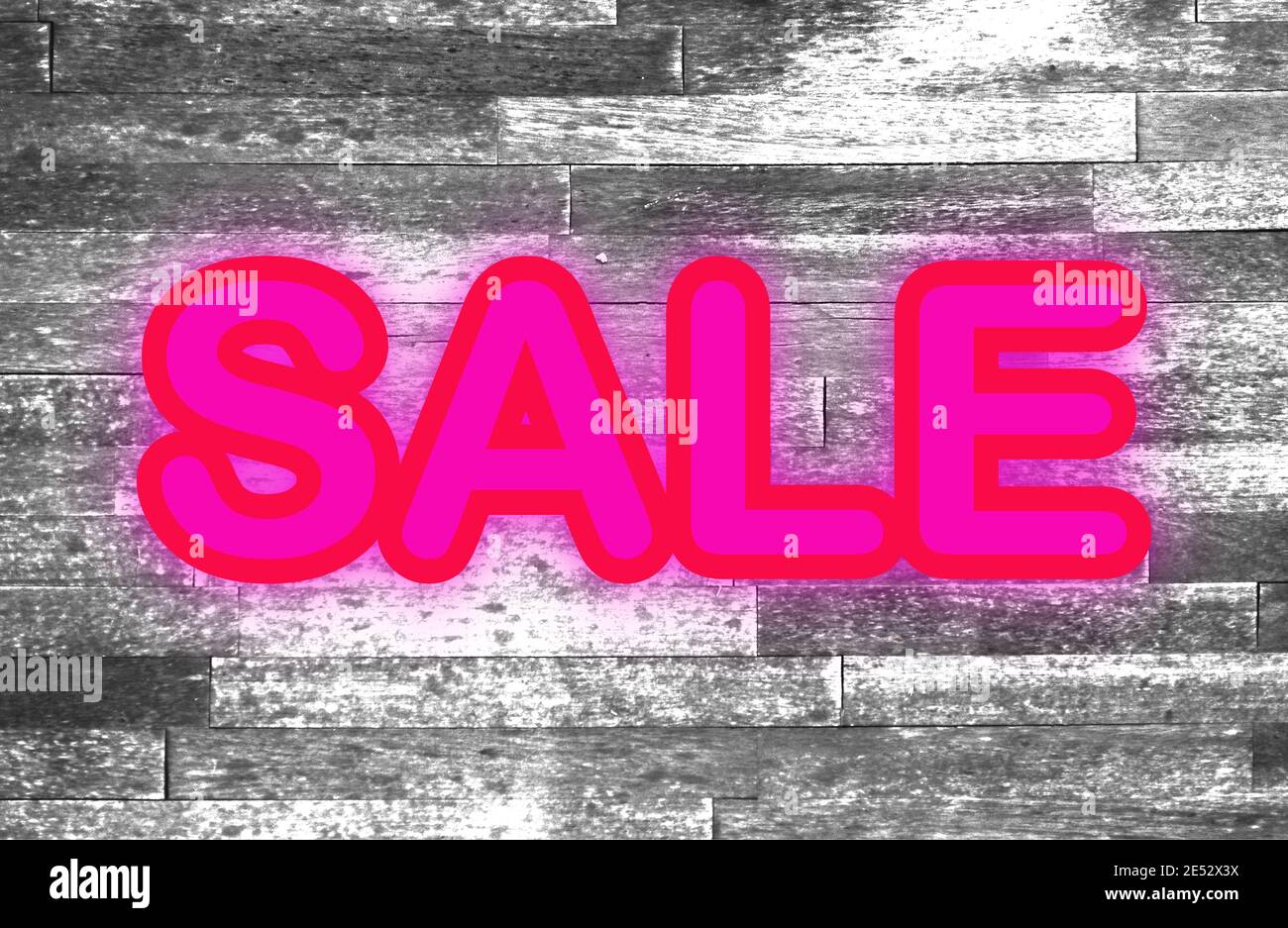 Parquet texturé noir et blanc avec texte rose fluo pour imiter un panneau néon. Banque D'Images
