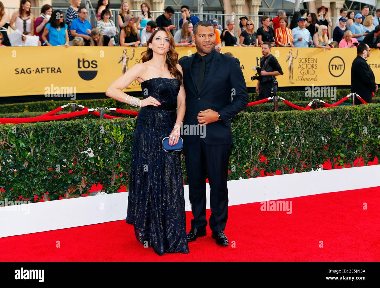 Actress Chelsea Peretti from the FOX series "Brooklyn Nine-Nine" and Jordan  Peele from the Comedy Central series "Key and Peele" arrive at the 21st  annual Screen Actors Guild Awards in Los Angeles,