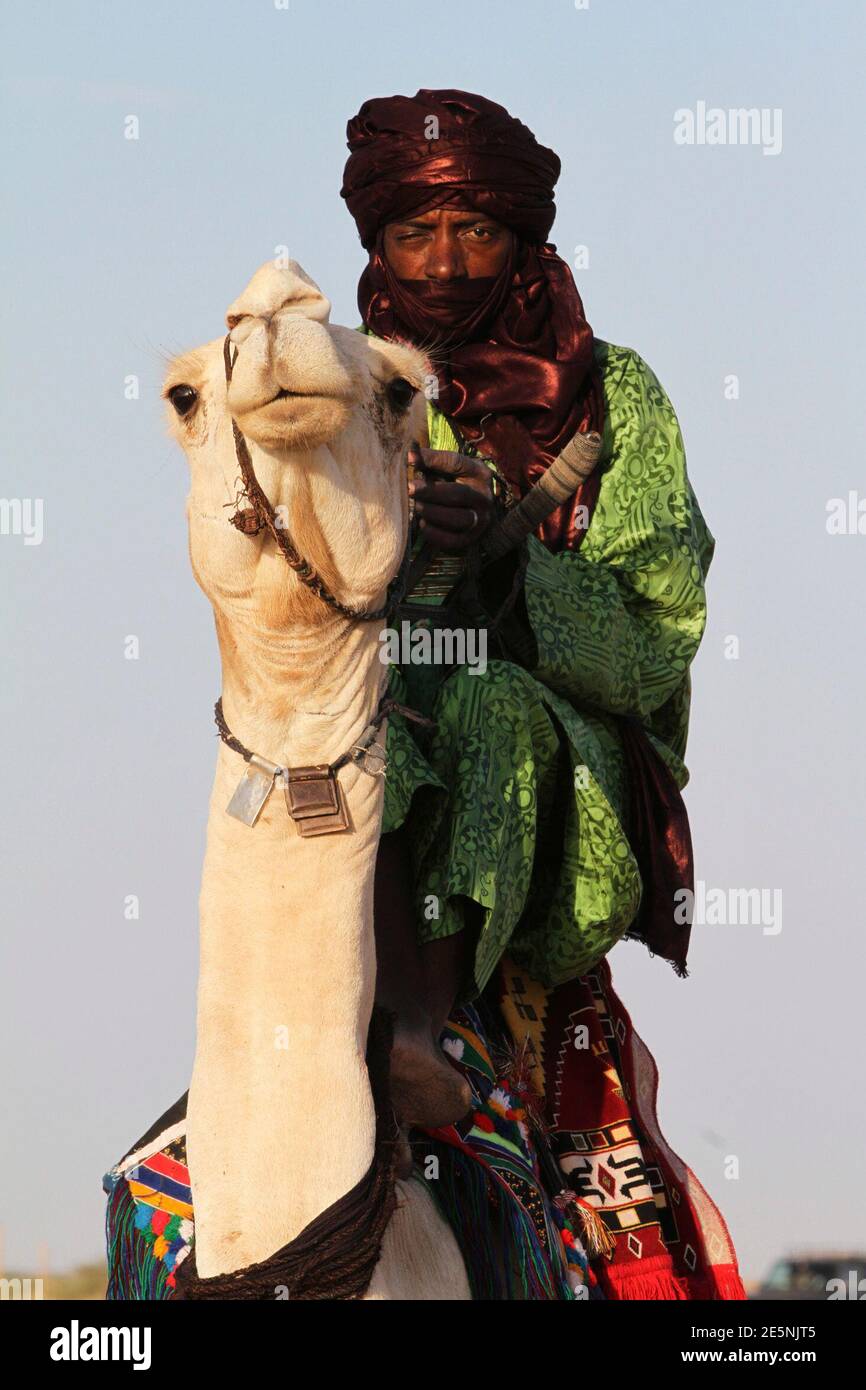 A Tuareg Man Riding On A Camel Takes Part In The Cure Salee Festival In Ingal September 17 2011 Tuareg Peul And Wodaabe Nomads Congregate Each Year At The Salt Flats Around