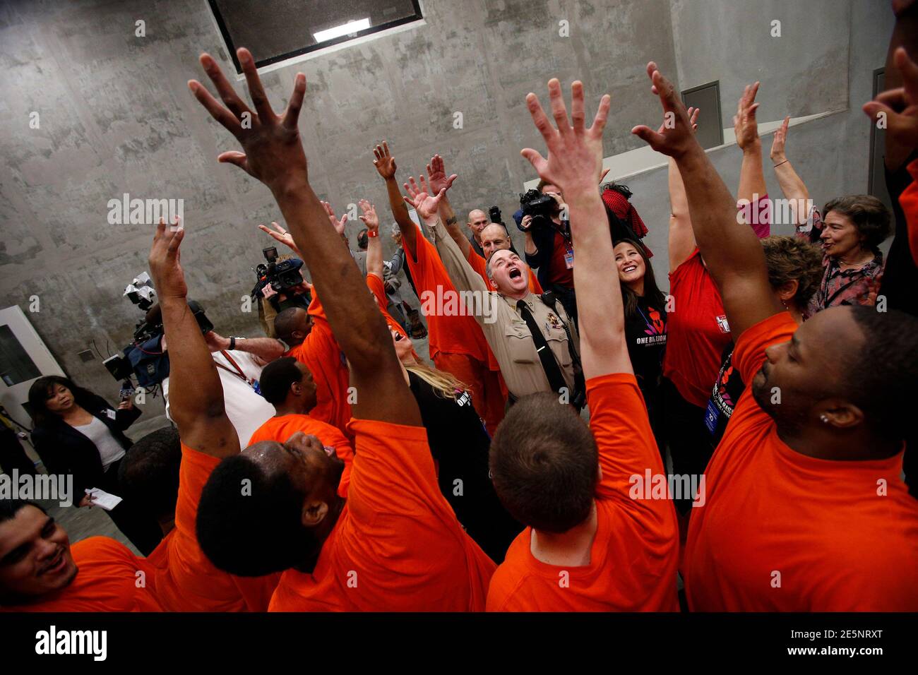 San Francisco Sheriff S Captain Kevin Paulson C And Eliana Lopez Wife Of San Francisco Sheriff Ross Mirkarimi R Cheer With A Group Of Inmates After Dancing Together In Opposition Of Violence Against