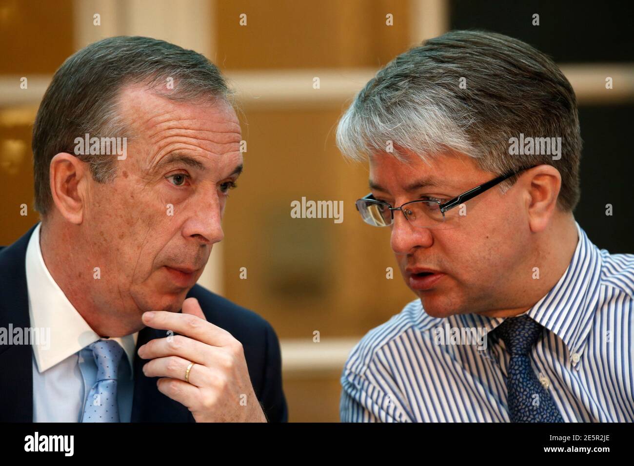 BNP Paribas bank Chief Executive Officer Jean-Laurent Bonnafe (R) speaks  with Alain Papiasse, BNP Head of Corporate & Investment Banking and Deputy  Chief Operating Officer, during the bank's 2014-2016 business development  plan