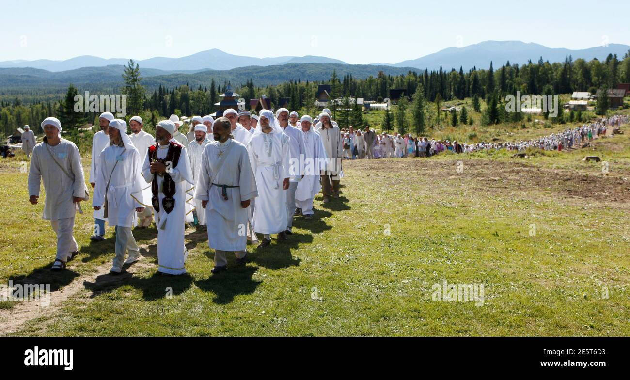 Members of the religious sect of Vissarion, who has proclaimed himself a new Christ, take part in a procession during the