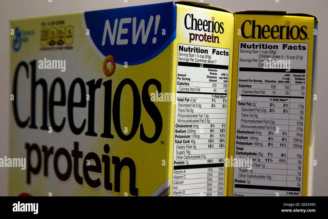 The nutritional labels of two types of Cheerios cereal, one ...