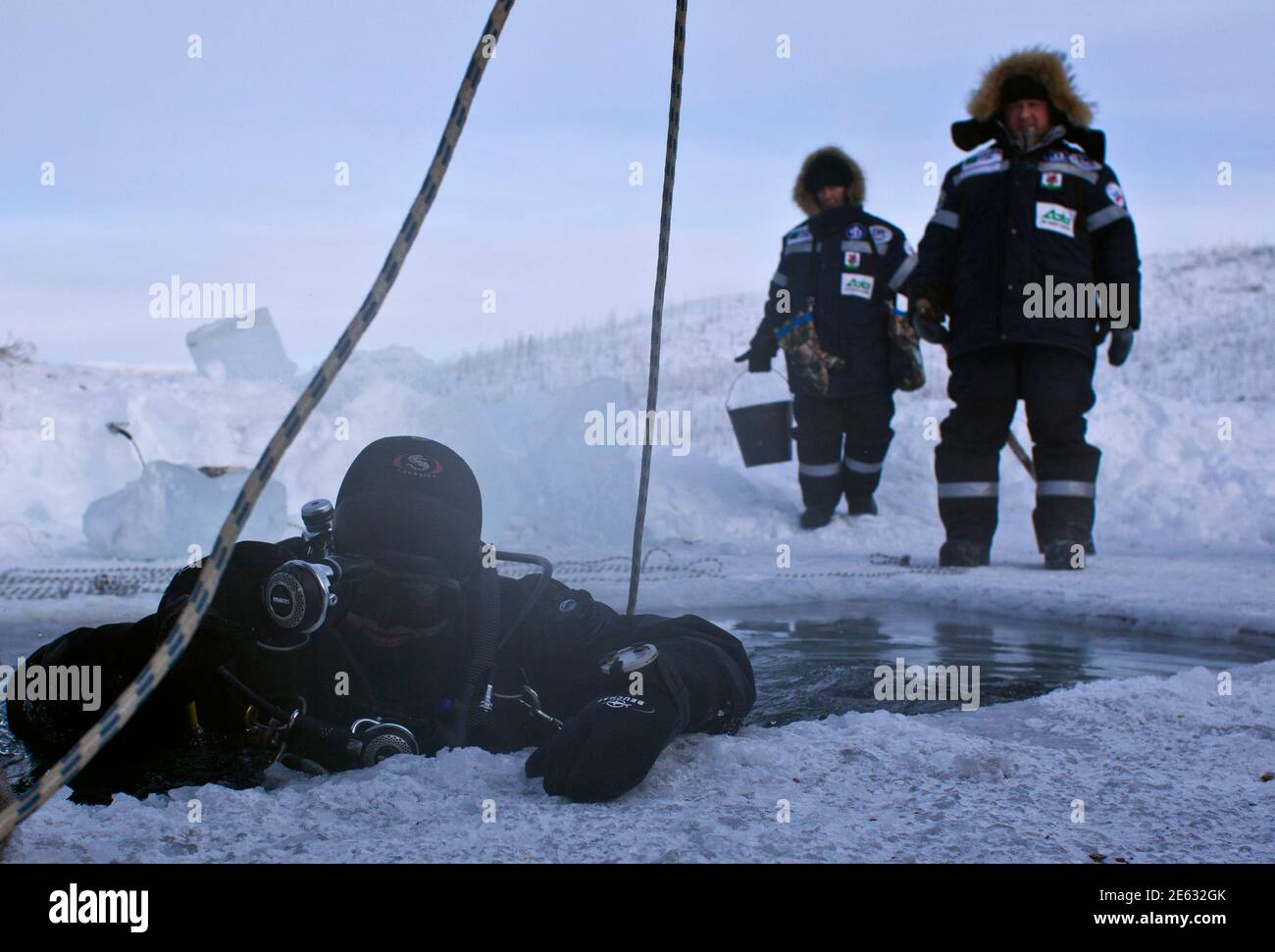 Alexander Gubin 43 Prepares To Dive Into The Frozen Labynkyr Lake Some 100 Km South From Oymyakon In The Republic Of Sakha Northeast Russia February 1 2013 The Coldest Temperatures In The