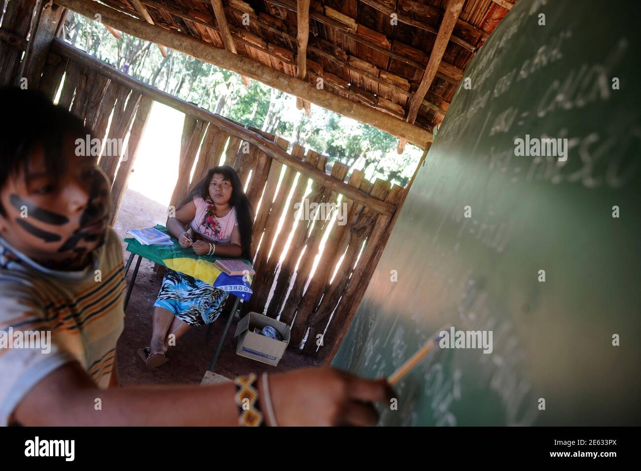 Guarani Ava Indian Paulina Takua Rokavy Back C Teaches Children In A School She Improvised On The Edge Of Their Ancestral Land They Call Tekoha Yvoh Y As They Await A Court S Decision