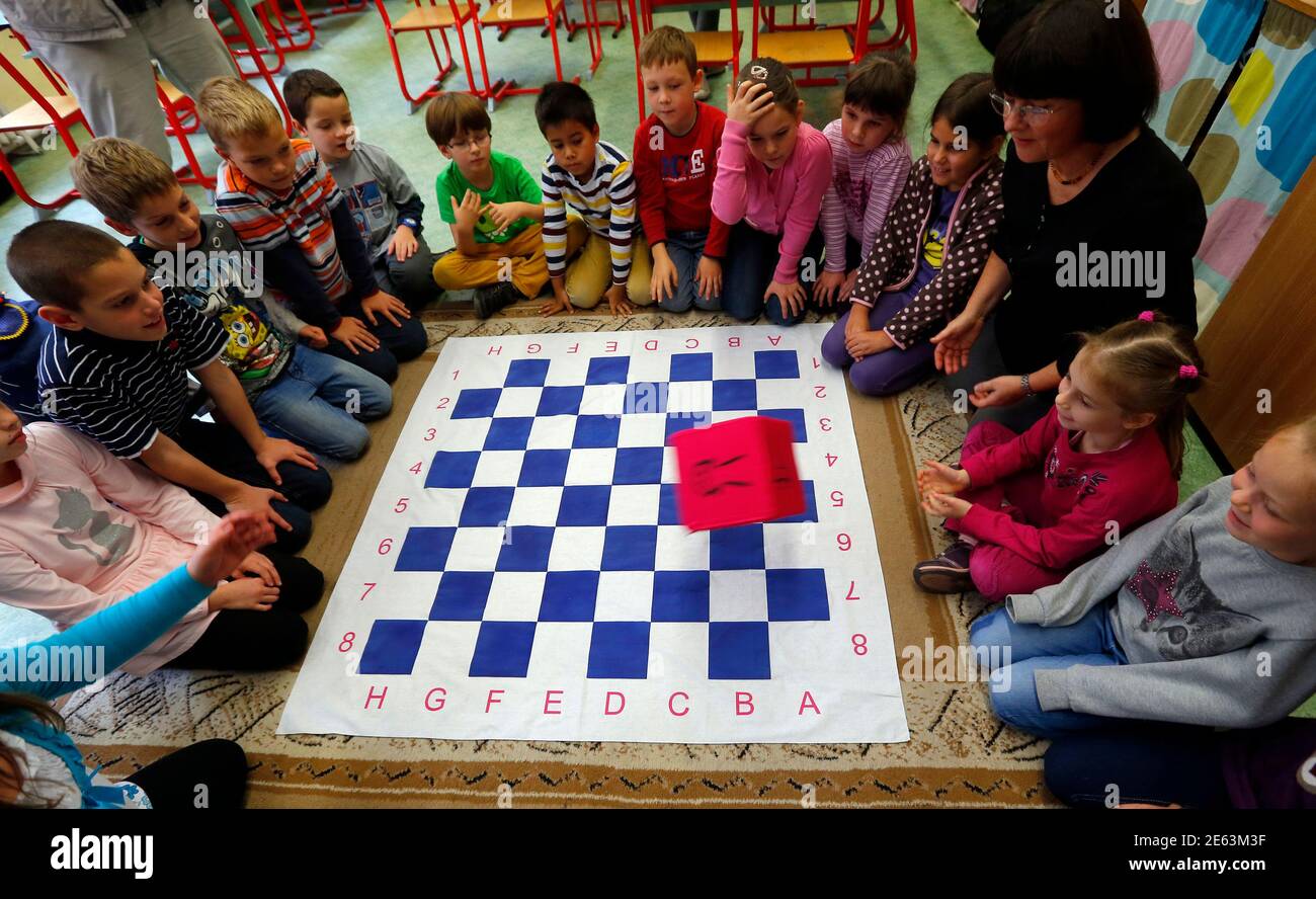 Judit Polgar, the best female chess player in the world, shows her  Chessplayground iPad application to children at the Dezso Lemhenyi school,  which uses her Chess Palace teaching programme, in Budapest October