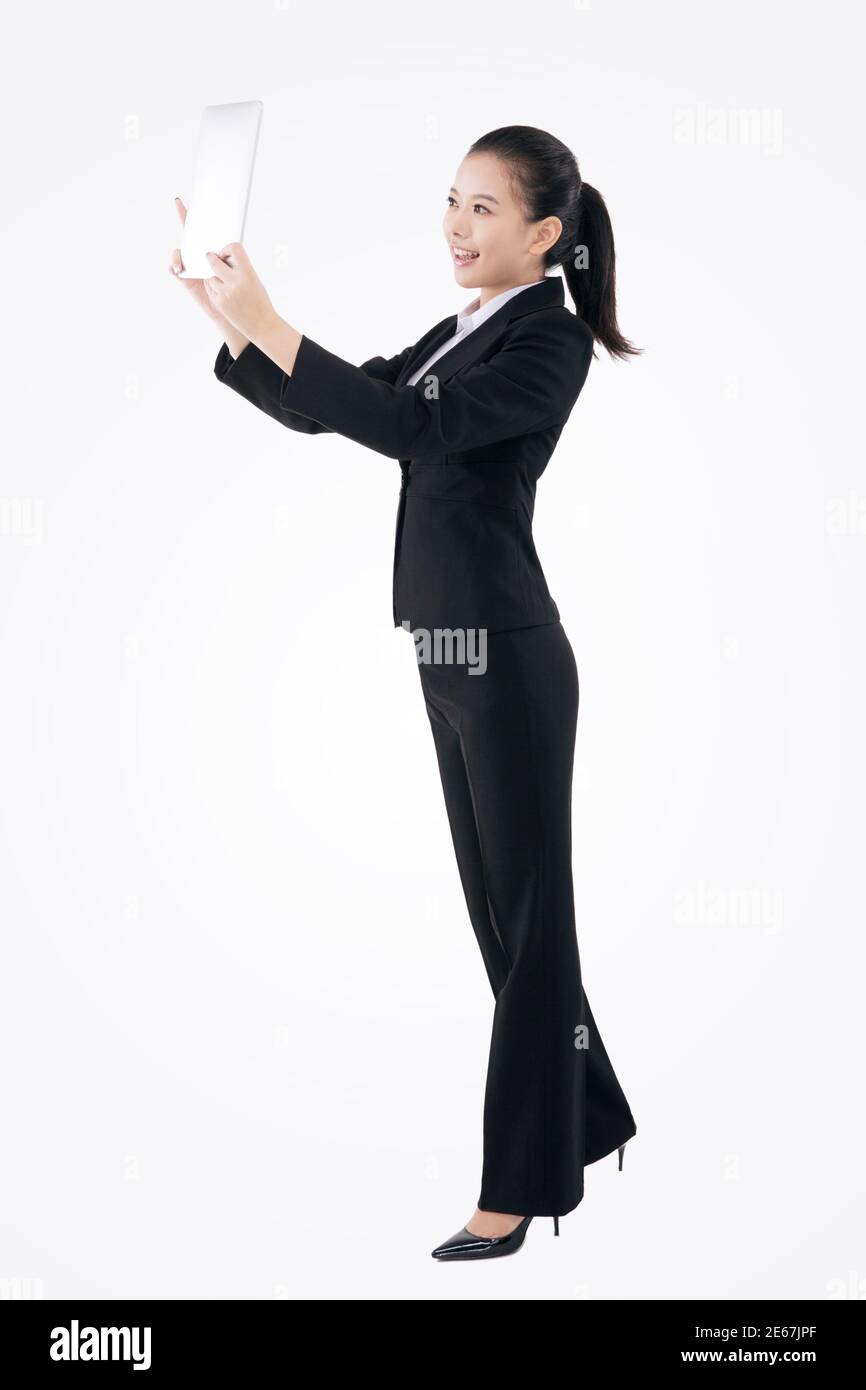 Femme d'affaires de mode orientale et IPAD photo de haute qualité Banque D'Images