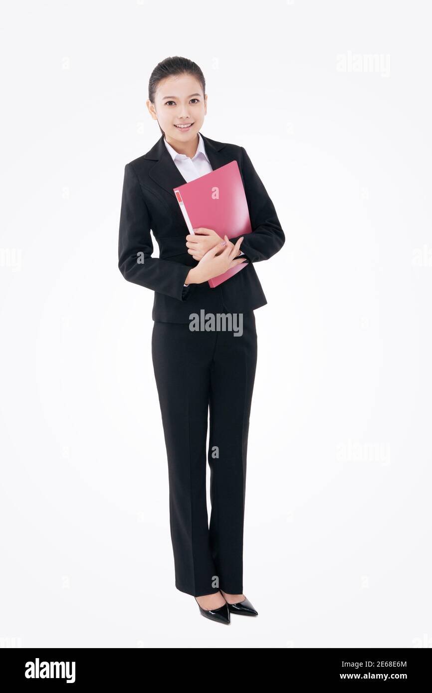 Femme d'affaires de mode tenant un dossier photo de haute qualité Banque D'Images