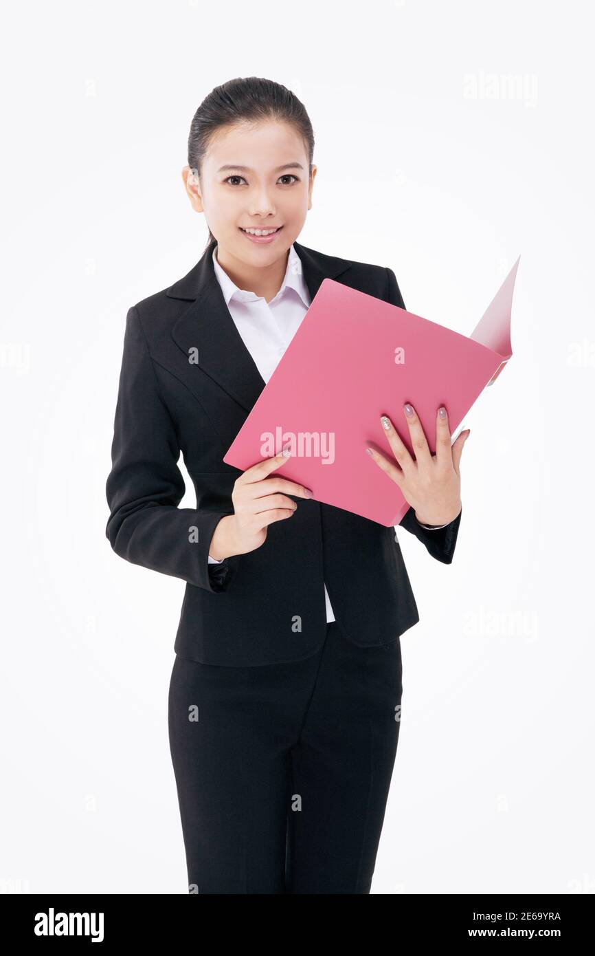Femme d'affaires de mode tenant un dossier photo de haute qualité Banque D'Images