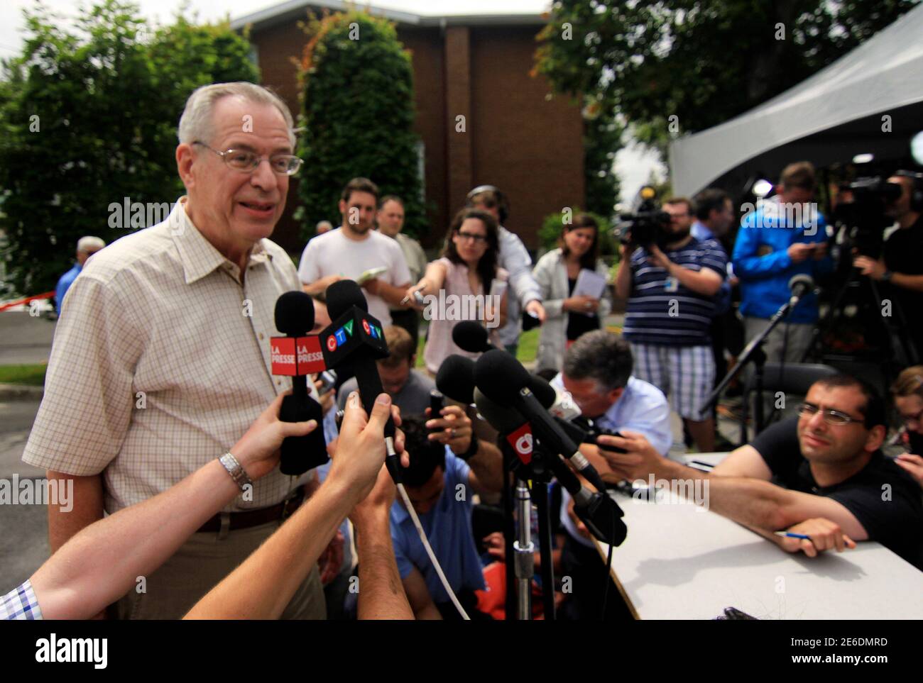 Ed Burkhardt, chairman of Montreal, Maine and Atlantic Railways (MMA),  speaks to the media as he arrives in Lac-Megantic, Quebec July 10, 2013.  Burkhardt, the head of the company whose oil-tanker train