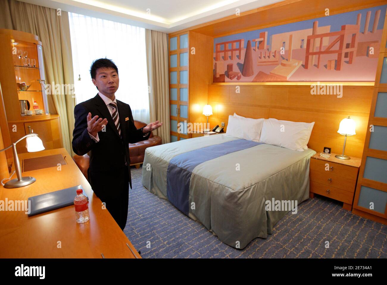 A Staff Shows A Room Designed By Designer Michael Graves At Hotel Michael One Of The Four Hotels At Resorts World Sentosa Integrated Casino Resort In Singapore January 10 Hotels At A Staff Shows A Room Designed By Designer Michael Graves At Hotel Michael One Of The Four Hotels At Resorts World Sentosa Integrated Casino Resort In Singapore January 10 Hotels At