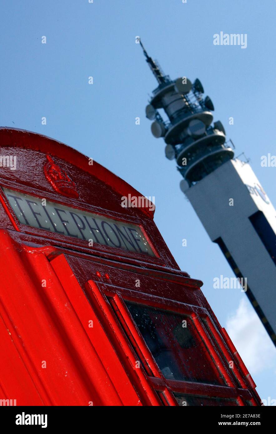 A telephone box is seen near the British Telecom tower in Birmingham,  central England February 10, 2009. Britain's BT Group on Thursday announced  it saw core earnings slump 9 percent in the