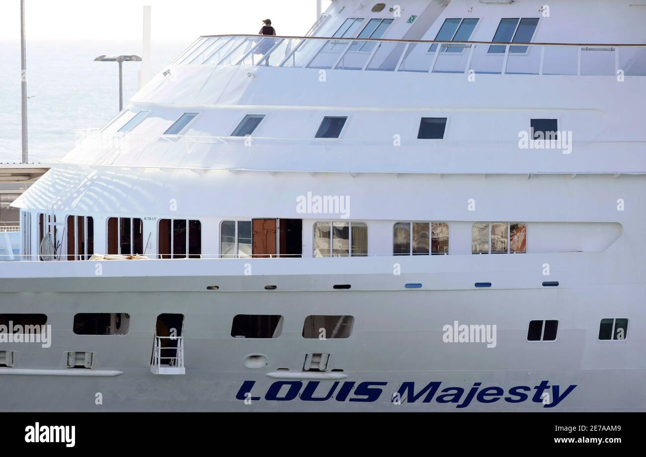 A Woman Stands Onboard The Louis Majesty Cruise Ship At Barcelona S Harbour March 4 2010 Two People Have Been Killed And Seven Injured By A Large Wave Which Struck A Cruise Ship