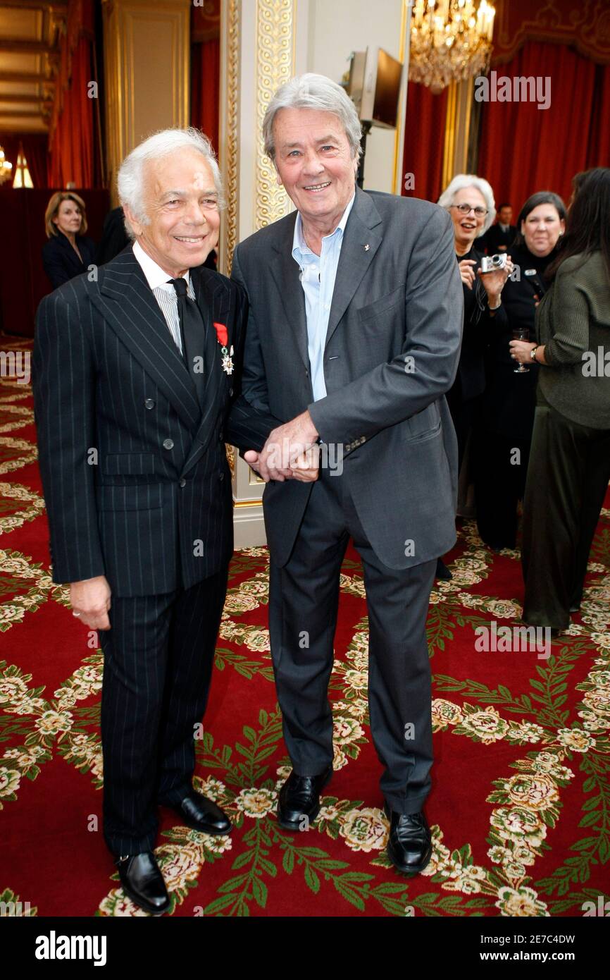 U.S. fashion designer Ralph Lauren (L) poses with French actor Alain Delon  after being named Chevalier of the Legion of Honour during a ceremony at  the Elysee Palace in Paris April 15,