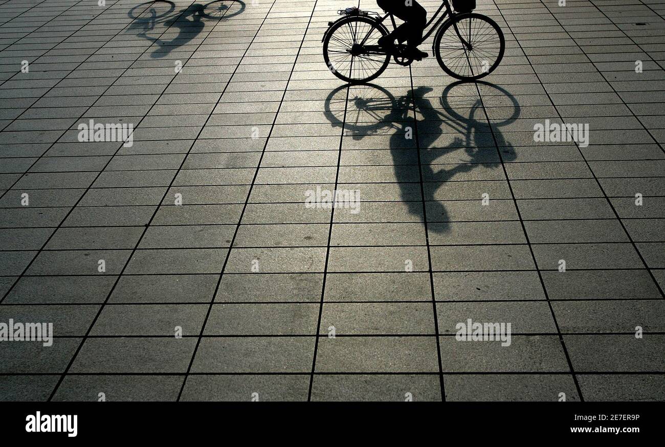 Cyclists ride in Taipei April 9, 2008 
