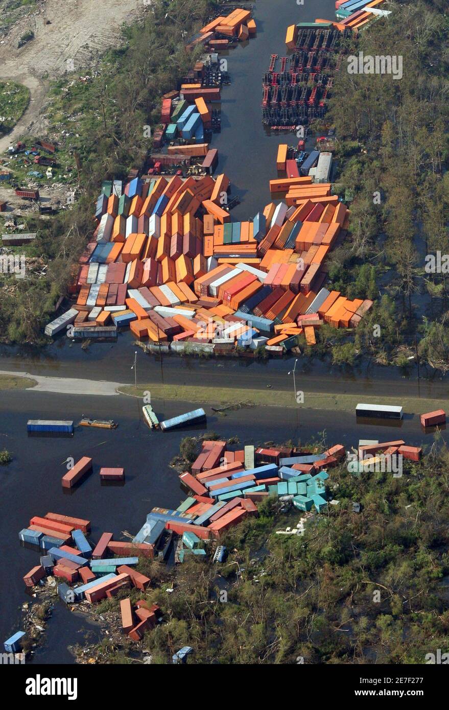 Cargo containers lay where they were tossed by Hurricane Katrina in New  Orleans August 31, 2005. Hellish scenes of death, damage, and chaos wracked  the U.S. Gulf Coast on Wednesday as overwhelmed