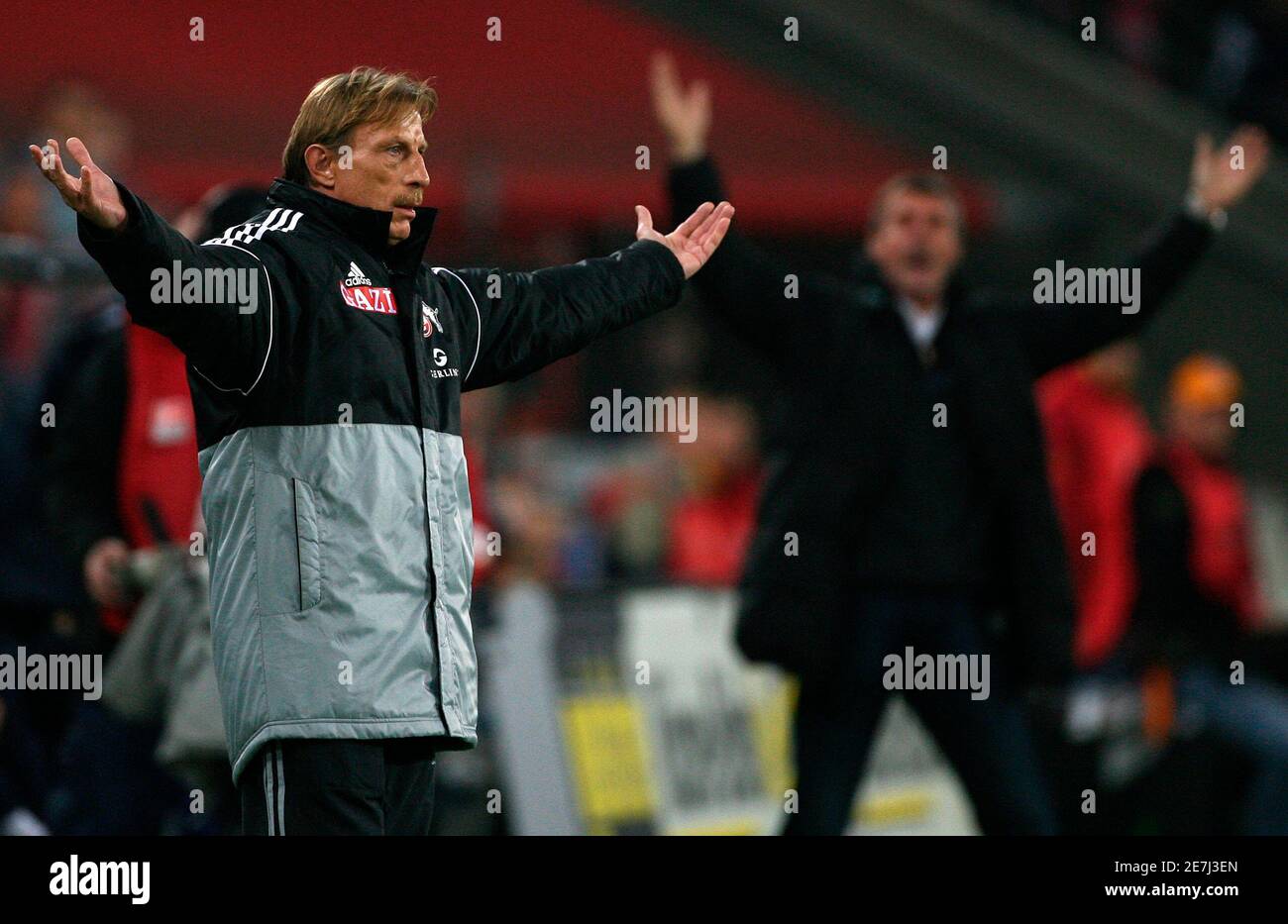 Cologne's new coach Christoph Daum (L) reacts during his team's German  second division match against Duisburg in Cologne December 4, 2006. It is  the first match for Daum, whose cocaine use cost