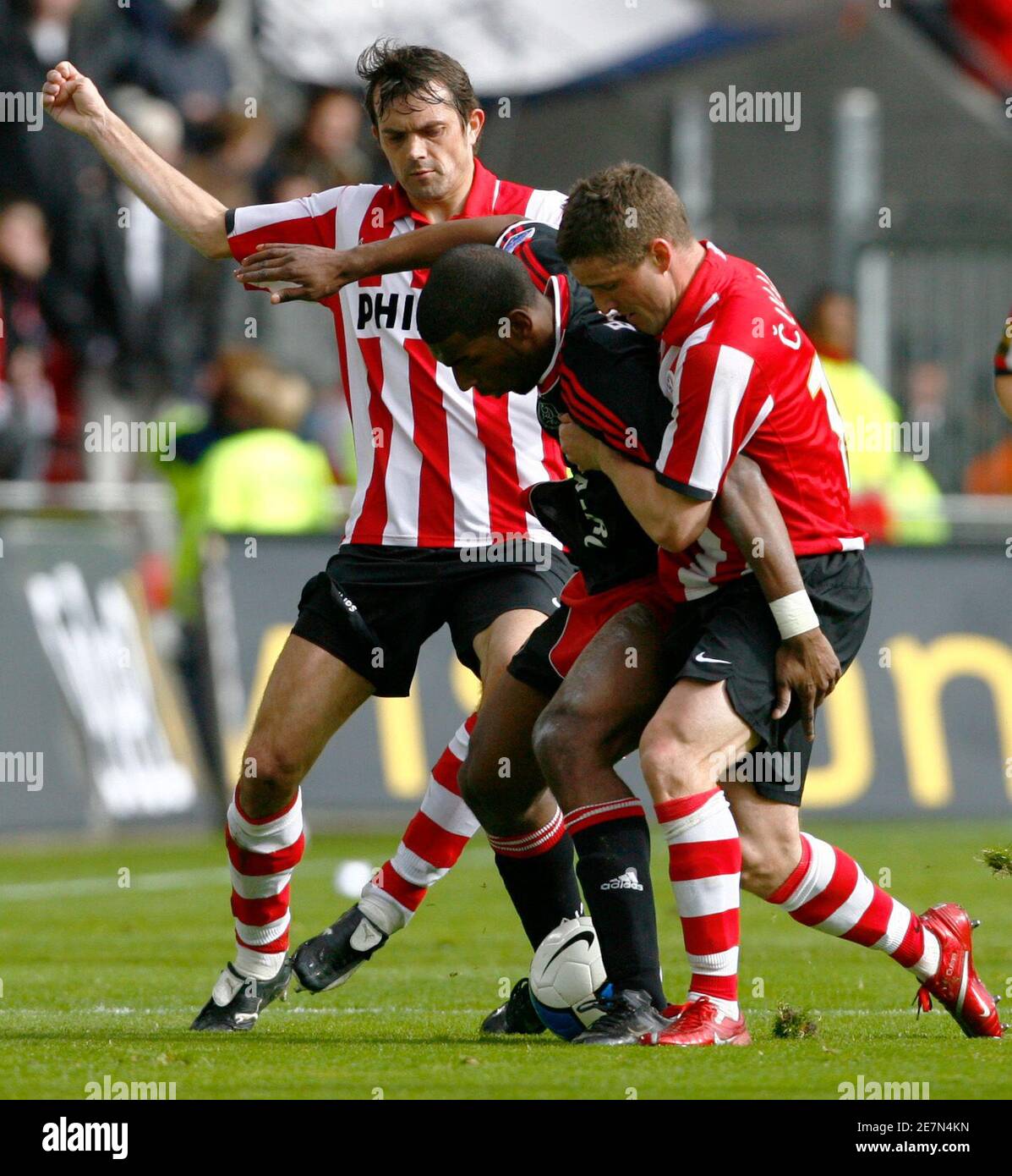 Ryan Babel Of Ajax Amsterdam C Fights For The Ball With Psv Eindhoven S Jason Culina R And Phillip Cocu L During Their Dutch League Soccer Match In Eindhoven March 18 07 Reuters Michael