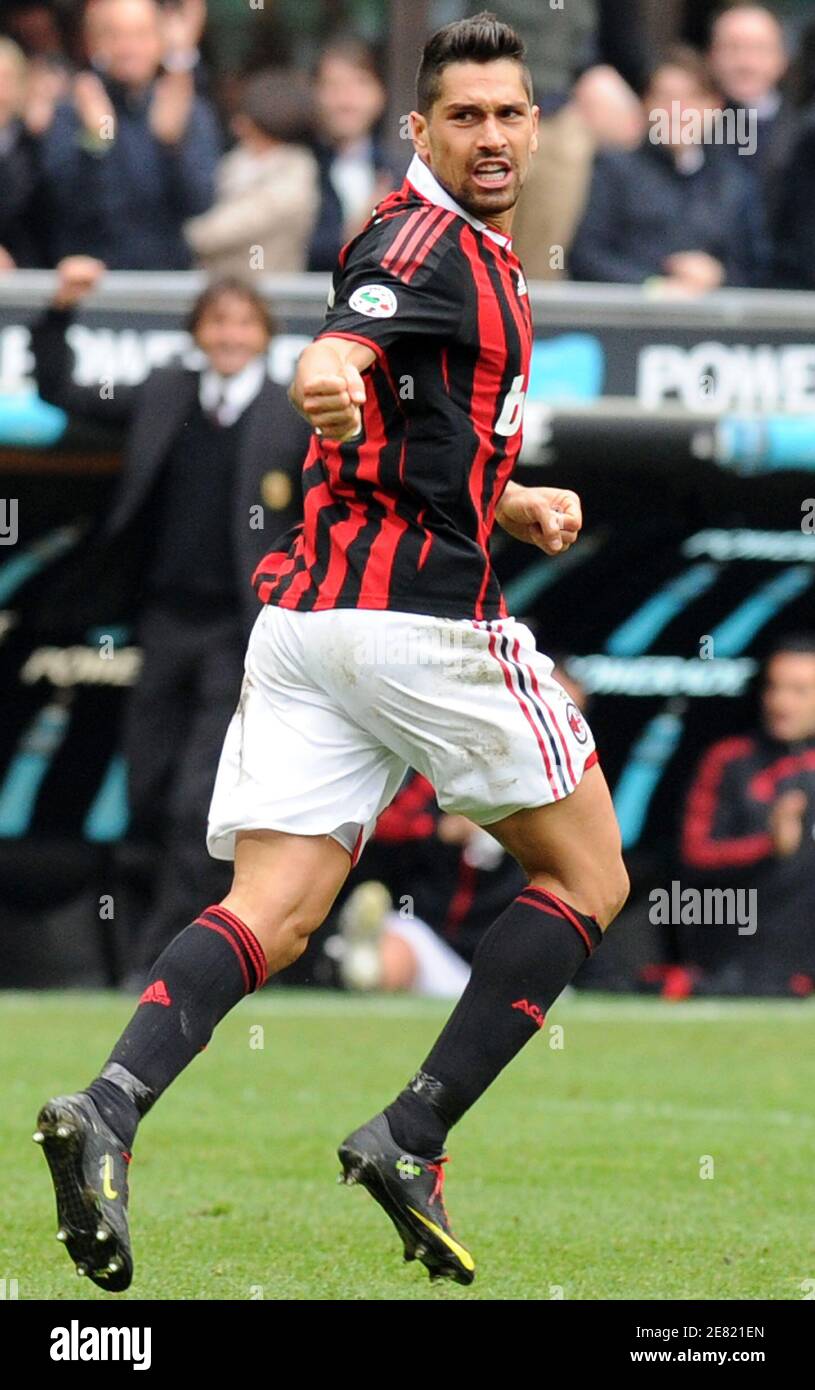 AC Milan's Marco Borriello celebrates after scoring against Catania in  their Italian Serie A soccer match at San Siro stadium in Milan, April 11,  2010. REUTERS/Paolo Bona (ITALY - Tags: SPORT SOCCER