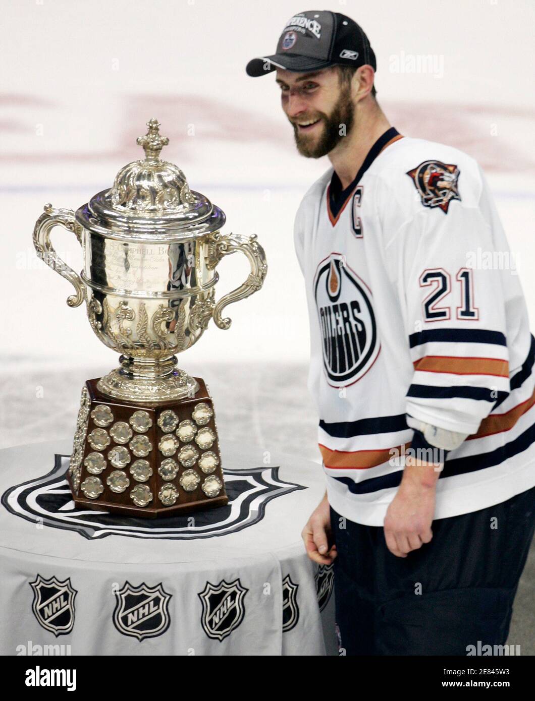 Edmonton Oilers captain Jason Smith poses with the Clarence S. Campbell  trophy after defeating the Mighty Ducks of Anaheim to win the NHL Western  Conference finals four games to one, in Anaheim,
