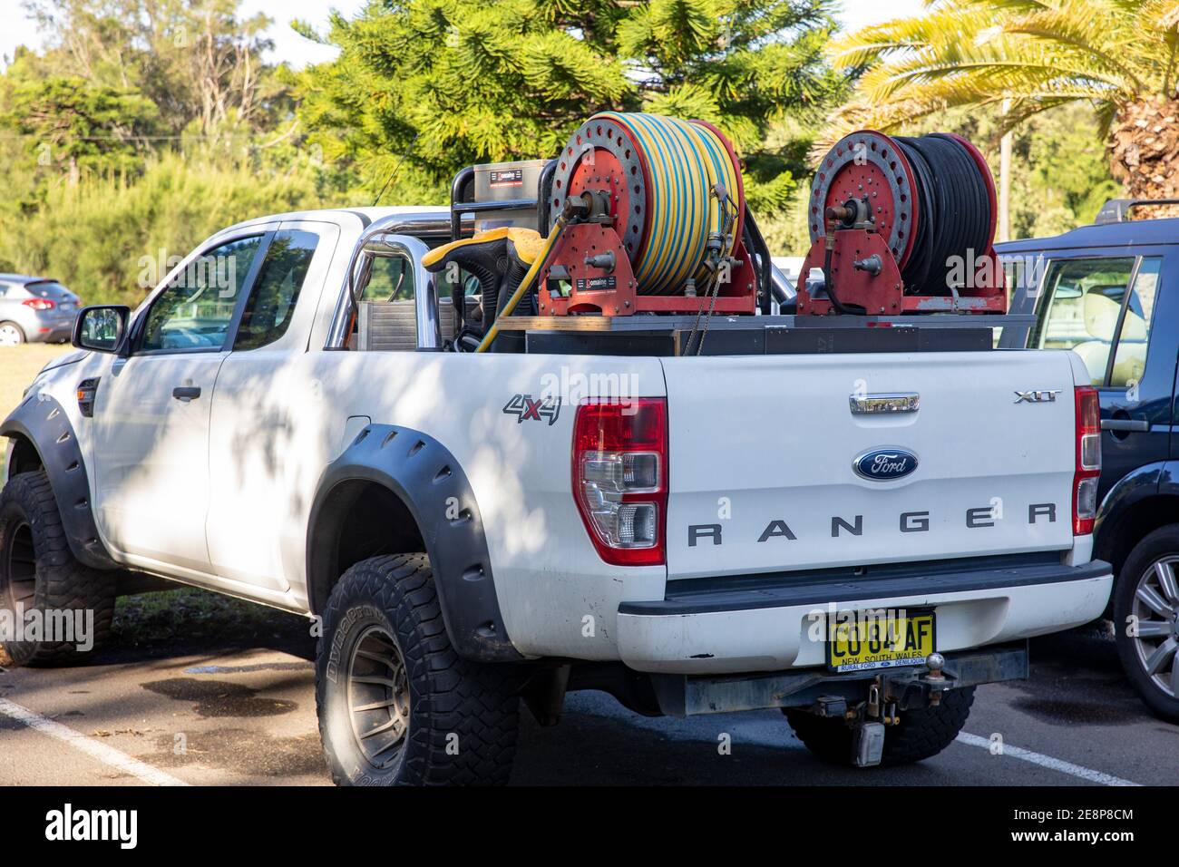 Blanc Ford rangeur ute camion transportant des plombiers équipement et outils, Sydney, Australie Banque D'Images