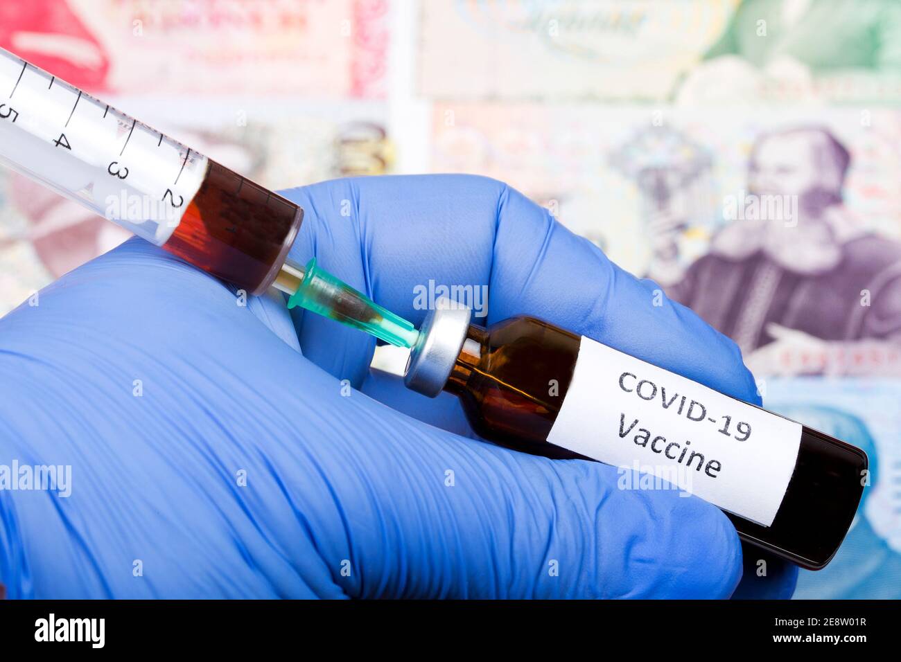 Vaccin contre Covid-19 sur fond de couronne islandaise Banque D'Images