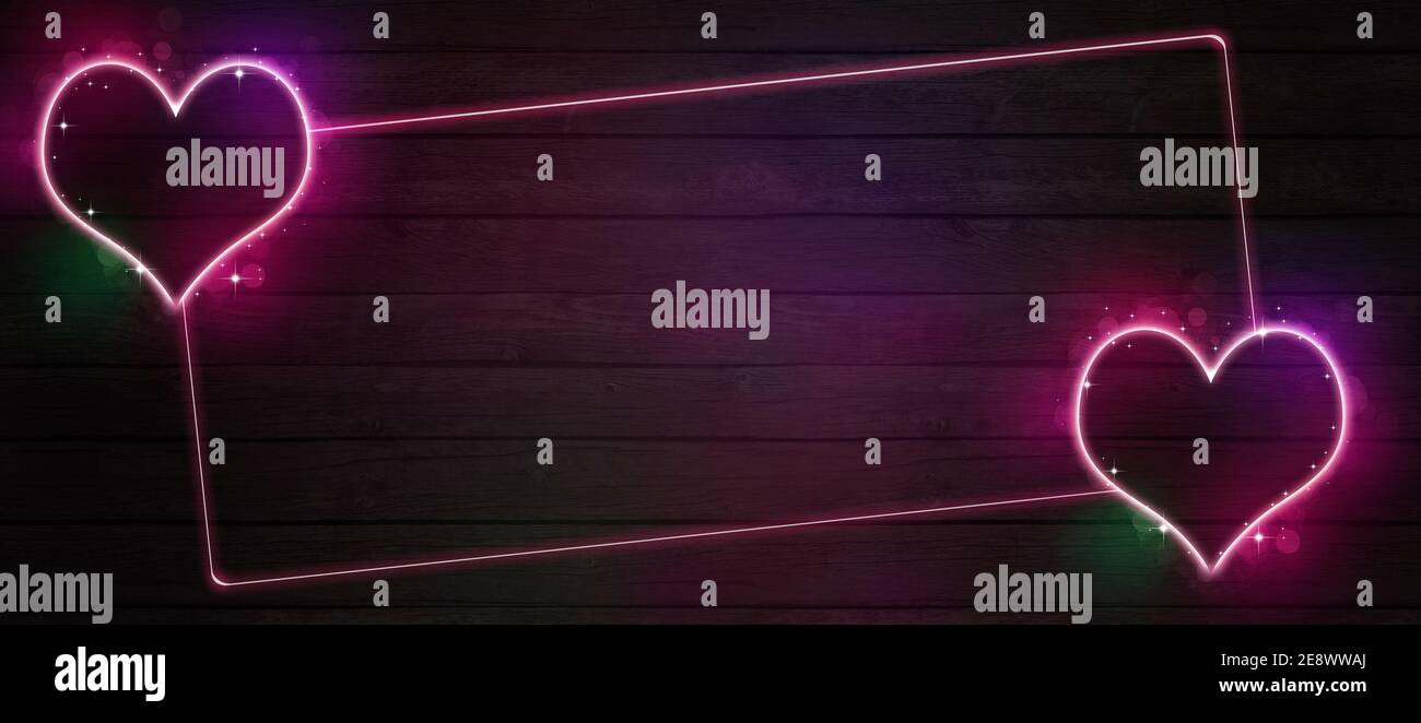 saint-valentin de l'amour des néons de l'amour grand bandeau avec multicolr forme en coeur brillant sur motif en bois sombre Banque D'Images