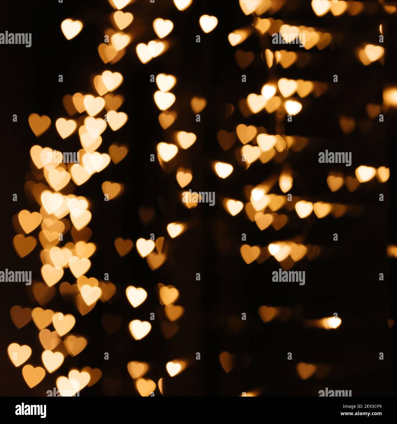 Fond doré bokeh lumières coeur, valentine arrière-plans, flou scintillant pour la nuit toile de fond. Bannière thème de l'amour défoqué. Emotio. Affectueuse et positive Banque D'Images