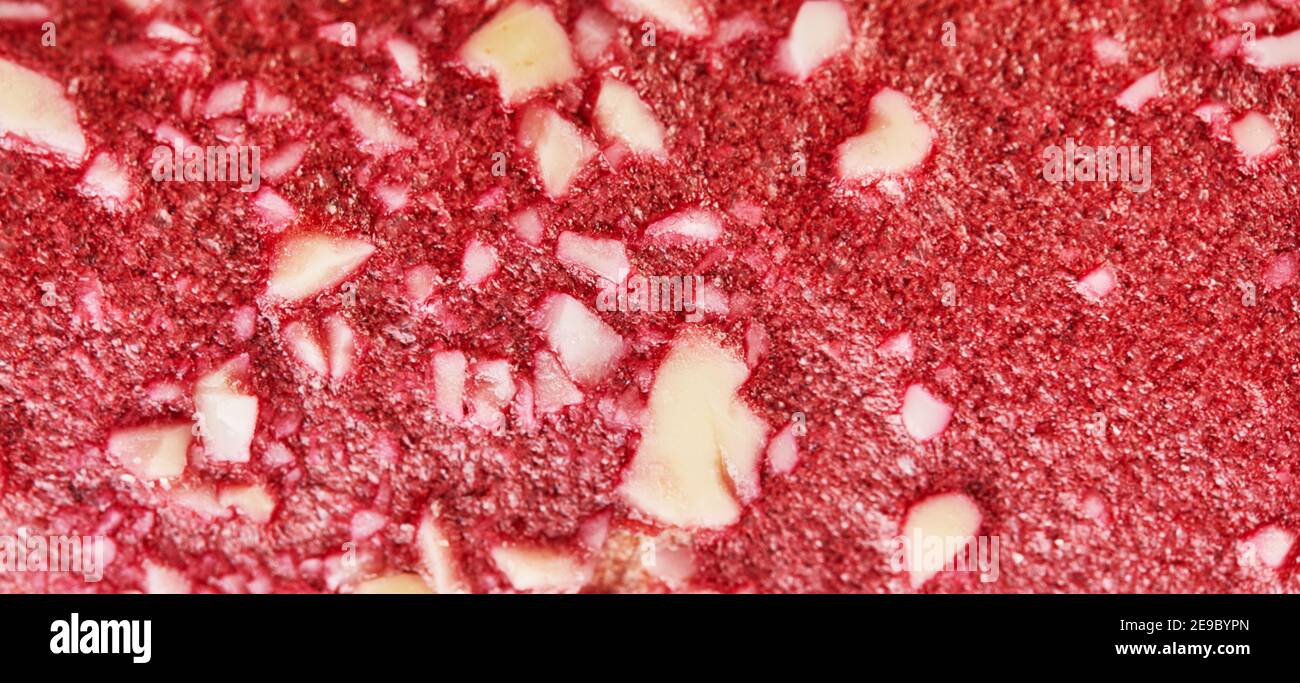 Texture de fond de pastille sucrée faite de fruits purs en rouleaux. Bonbons naturels de baies et de fruits. Alimentation en vitamine et en nourriture végétalienne Banque D'Images
