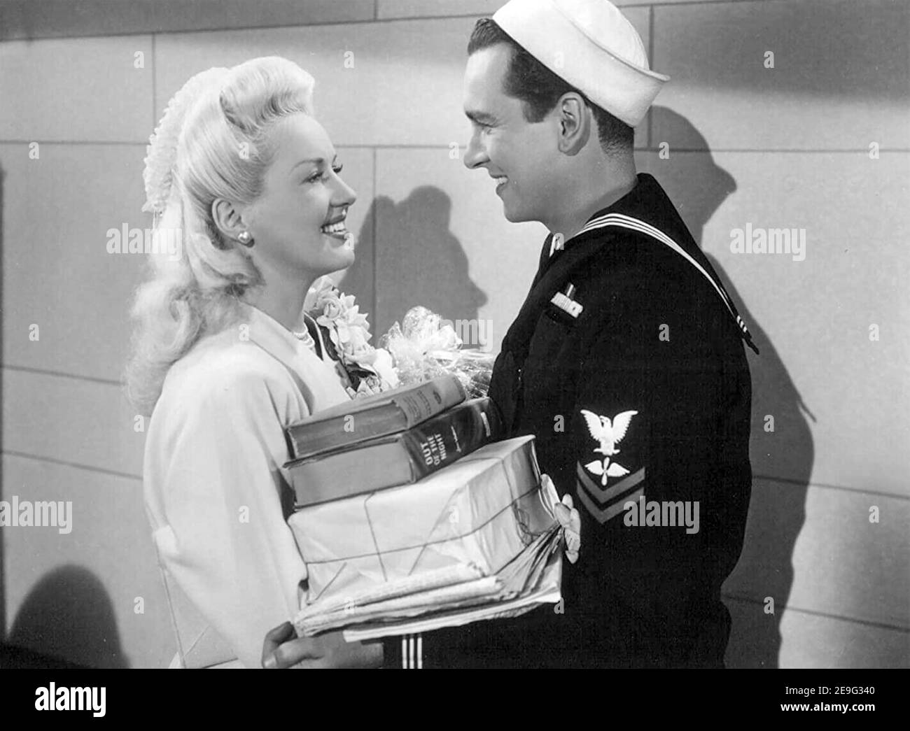 ÉPINGLER FILLE 1944 20th Century Fox film avec Betty Grable et John Harvey Banque D'Images