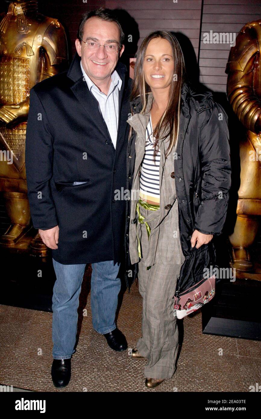 Jean-Pierre Pernaut et son épouse Nathalie assistent à l'après-fête pour la  première du jeu de la verite au nouveau restaurant 'Qin' à Paris, le 21  février 2005. Photo de Benoit Pinguet/ABACA Photo