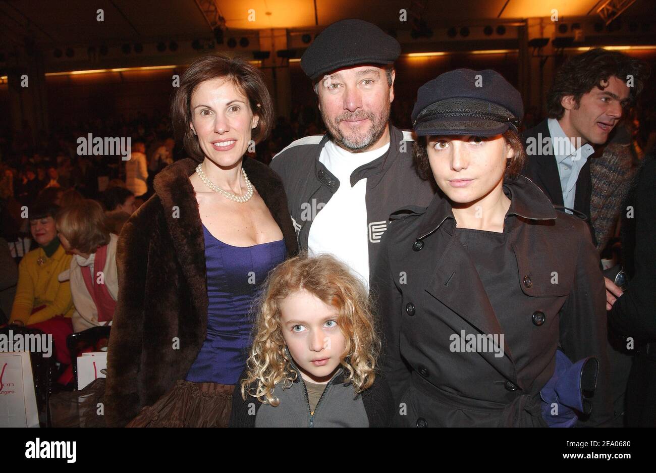 Le designer français Philippe Starck, sa femme et ses fils photographiés  avant la présentation de la collection prêt-à-porter Emanuel Ungaro  automne-hiver 2005-2006 à Paris, France, le 2 mars 2005. Photo de  Klein-Hounsfield/ABACA.æ