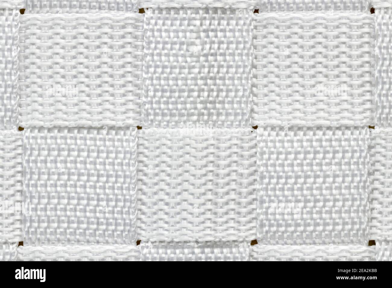 Résumé alternance horizontale et verticale composée de carrés de nylon blanc tissé. Banque D'Images
