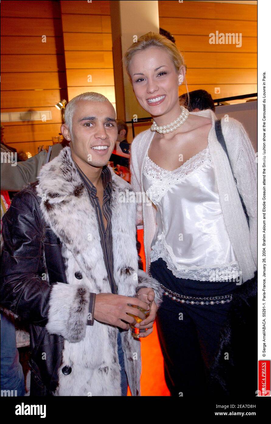 © Serge Arnal/ABACA. 55291-1. Paris-France, le 26 janvier 2004. Brahim Asloum et Elodie Gossuin assistent au défilé de mode Smalto au carrousel du Louvre à Paris. Banque D'Images