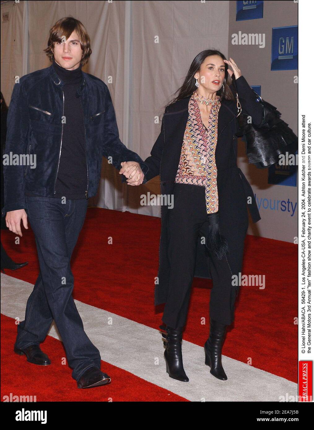 © Lionel Hahn/ABACA. 56429-1. Los Angeles-CA-USA, 24 février 2004. Ashton Kutcher et demi Moore participent au 3e défilé annuel de mode et à l'événement caritatif de General Motors pour célébrer la saison des prix et la culture automobile. Banque D'Images