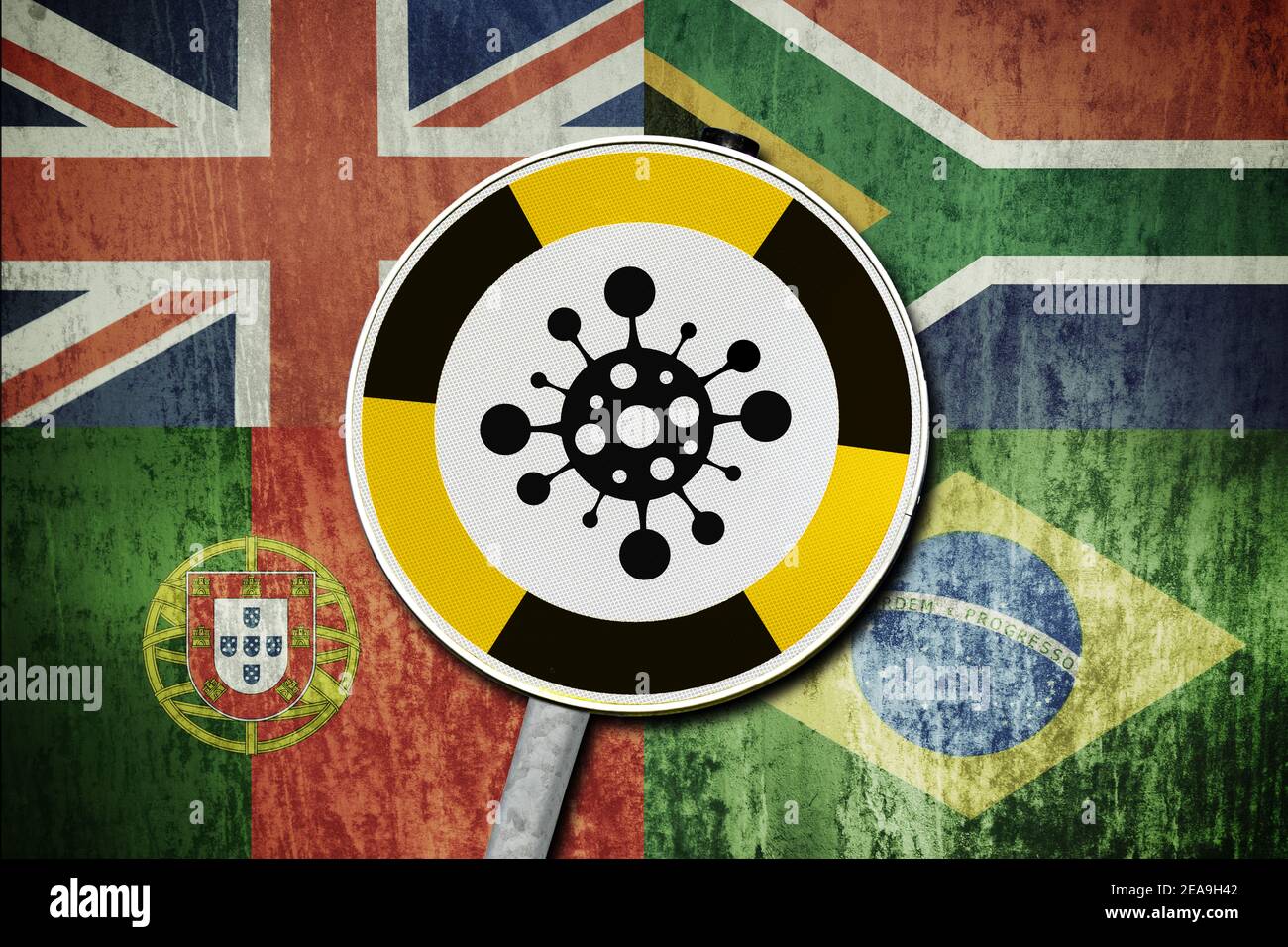 Panneau d'avertissement Covid devant les drapeaux de la Grande-Bretagne, du Brésil, du Portugal et de l'Afrique du Sud, mutations covid Banque D'Images