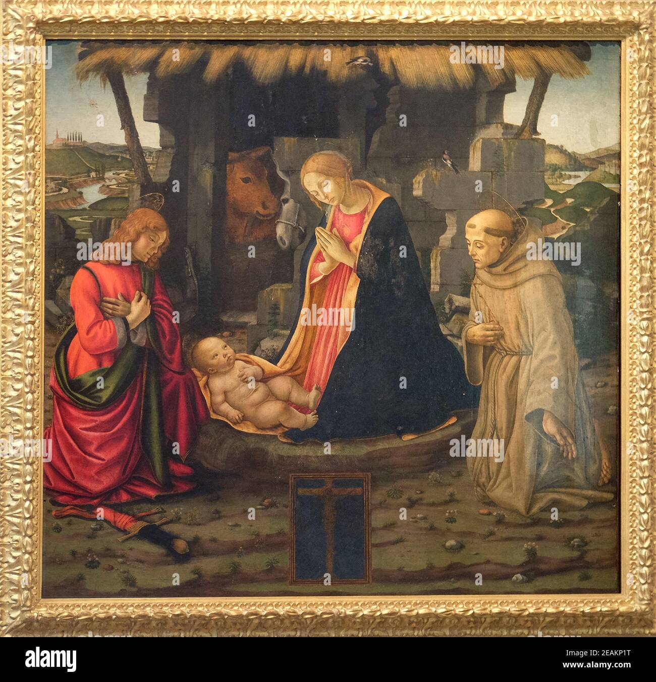 Scène de la nativité avec les saints Julien et Francis, de l'École de Domenico Ghirlandaio la basilique San Lorenzo à Florence, Italie Banque D'Images