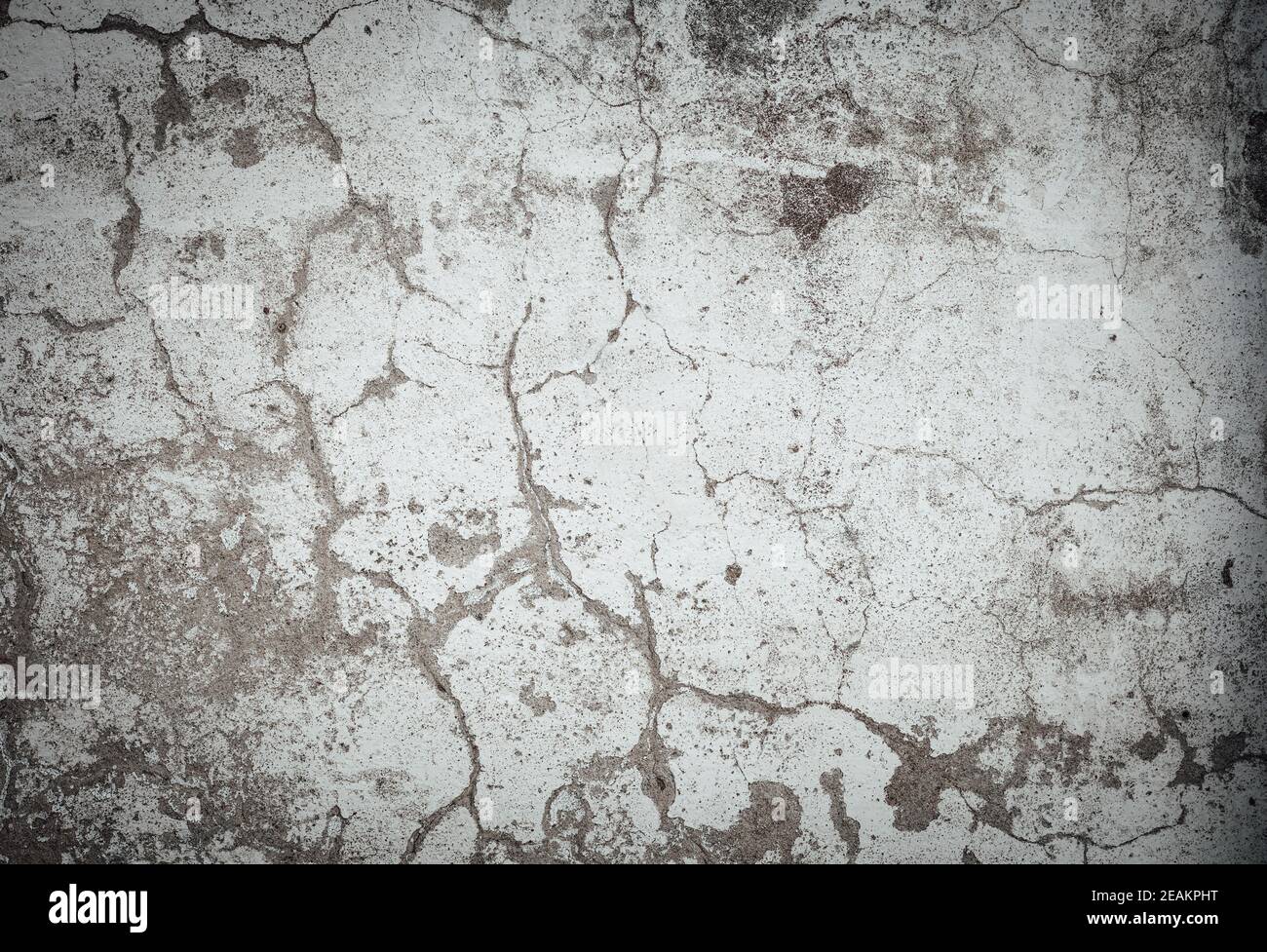 Ancienne texture de mur en béton fissuré. Arrière-plan abîmé. Banque D'Images