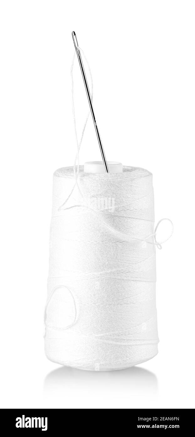 La canette blanc avec aiguille isolated on white Banque D'Images