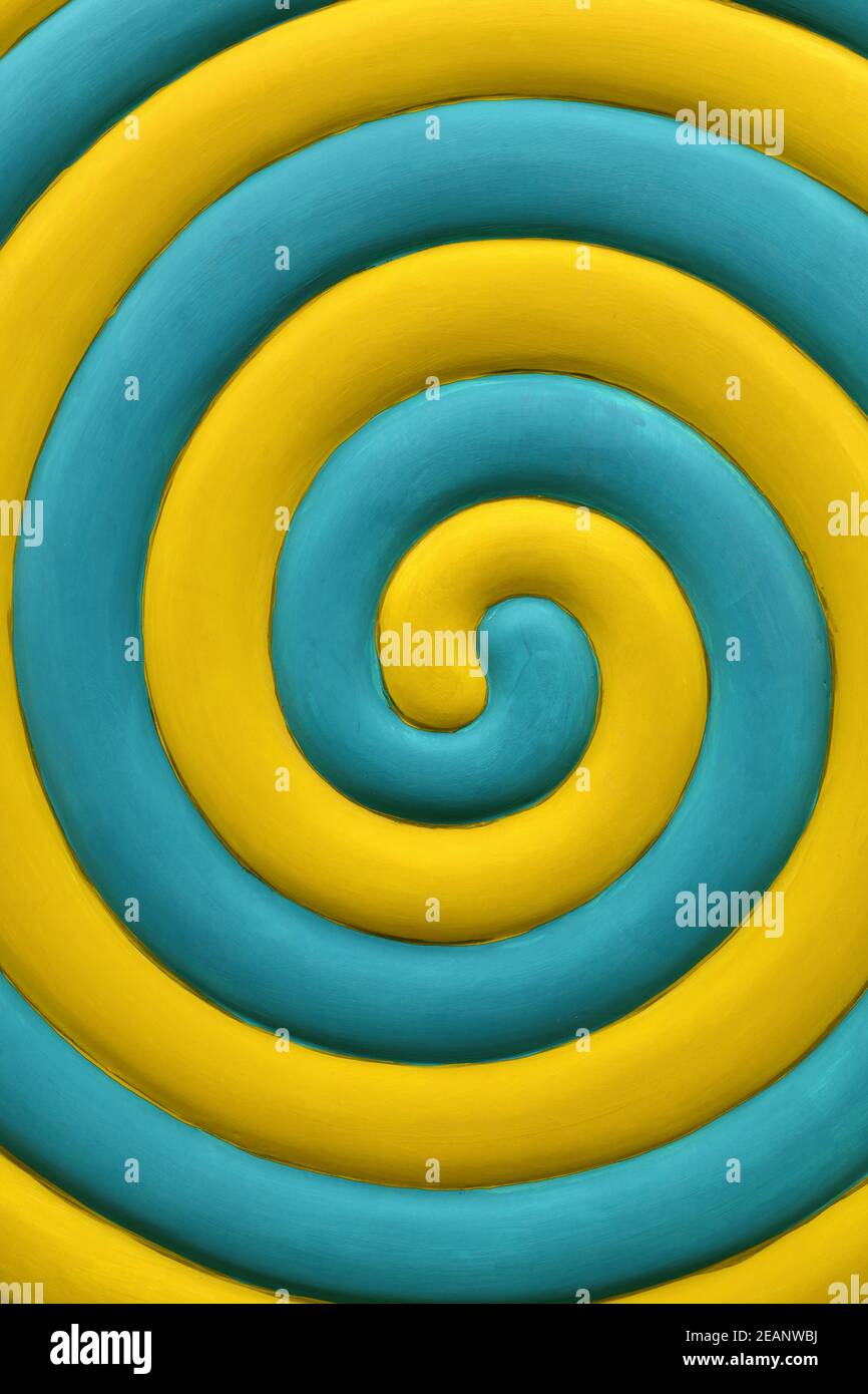 Fond en spirale jaune et bleu sarcelle Banque D'Images