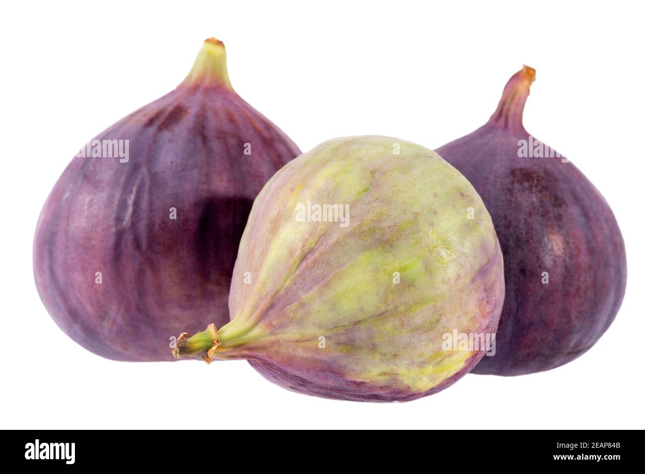 Groupe de fruits violets frais et verts de figues isolés sur fond blanc, gros plan Banque D'Images