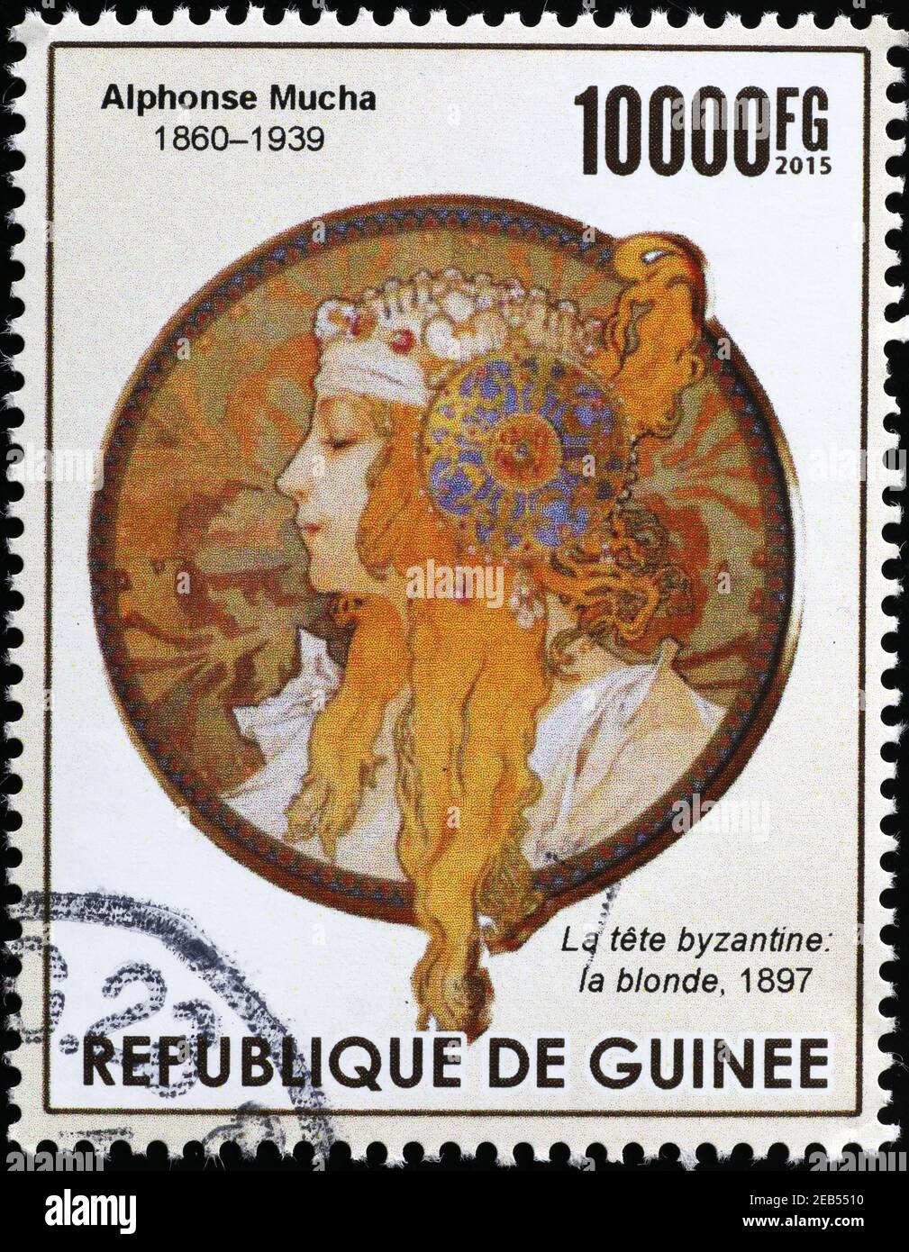 Illustration de la femme par Mucha sur le timbre-poste de la Guinée Banque D'Images