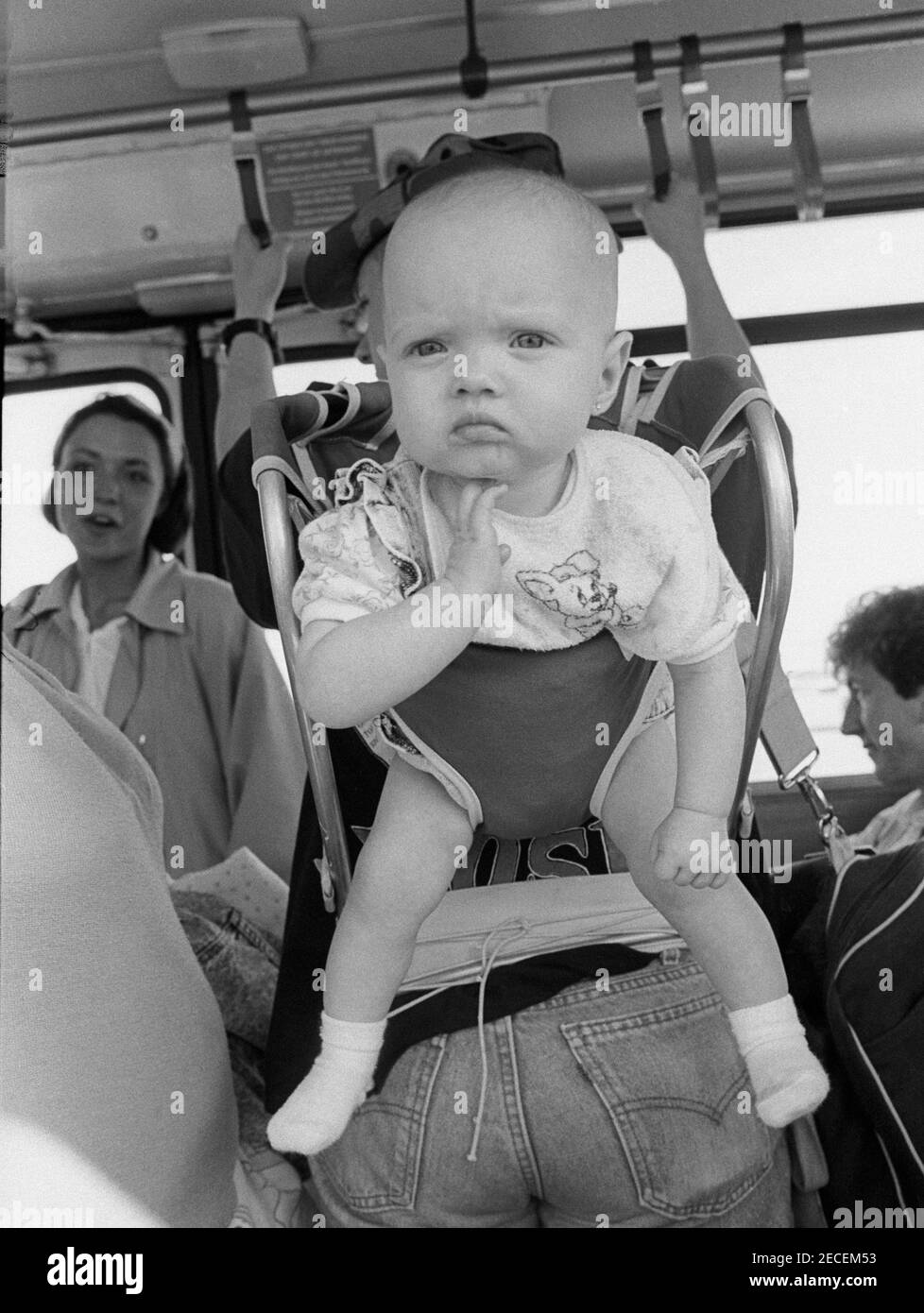 Bébé dans le bus, Brooklyn, New York.City Banque D'Images