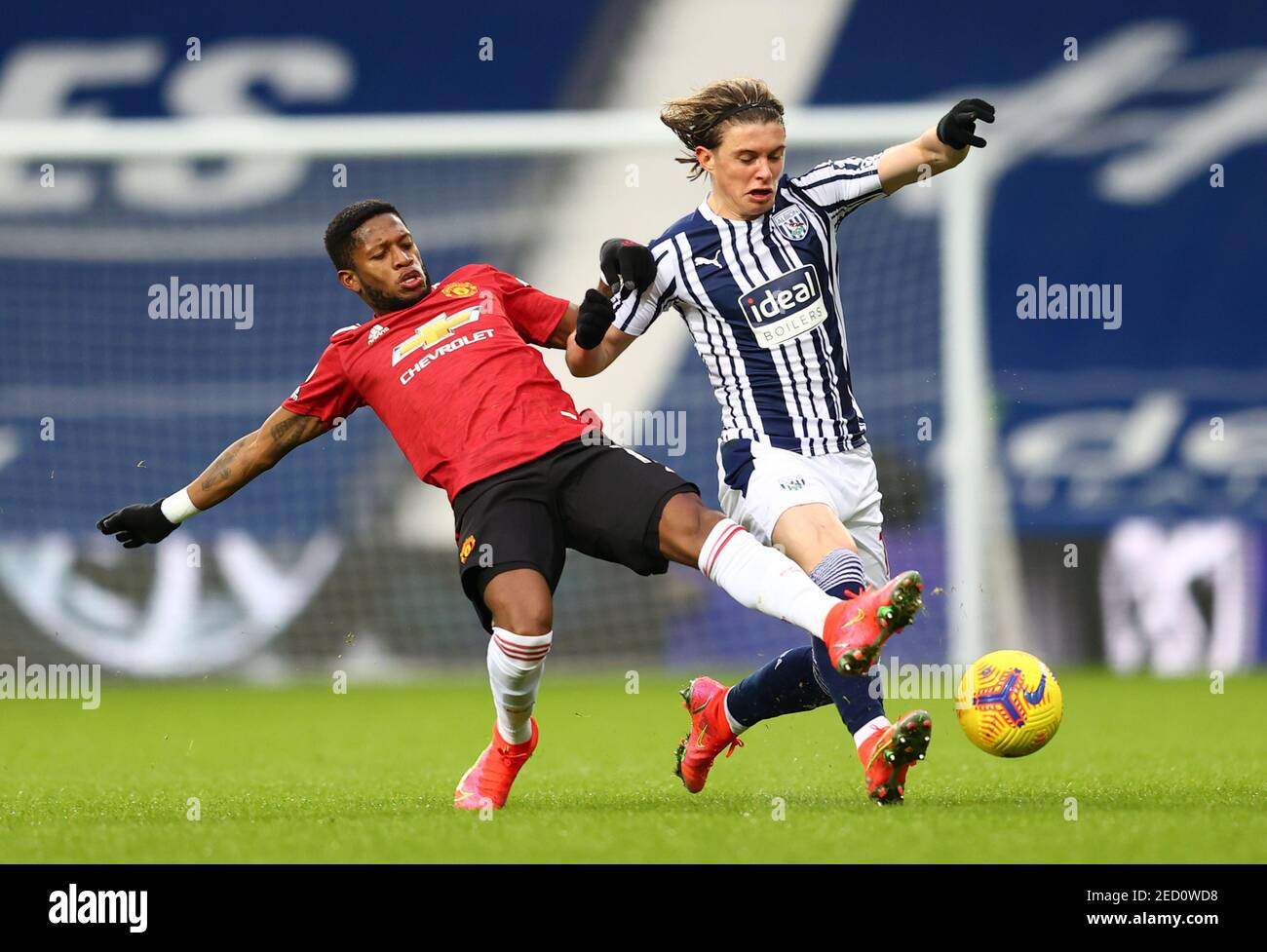 Lee Peltier, de Manchester United, de Bruno Fernandes West Bromwich Albion, et Anthony Martial, de Manchester United, se battent pour le ballon lors du match de la Premier League aux Hawthorns, West Bromwich. Date de la photo: Dimanche 14 février 2021. Banque D'Images Lee Peltier, de Manchester United, de Bruno Fernandes West Bromwich Albion, et Anthony Martial, de Manchester United, se battent pour le ballon lors du match de la Premier League aux Hawthorns, West Bromwich. Date de la photo: Dimanche 14 février 2021. Banque D'Images