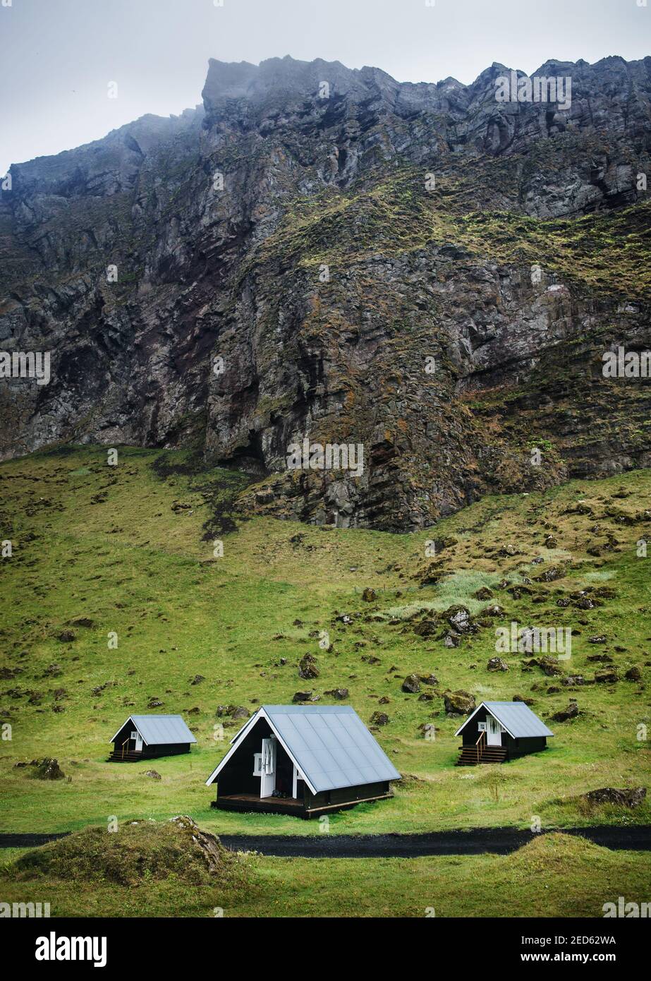 Petites cabines dans la vallée de Herjólfsdalur sur l'île de Heimaey, les îles Westman, l'Islande, la Scandinavie, l'Europe Banque D'Images