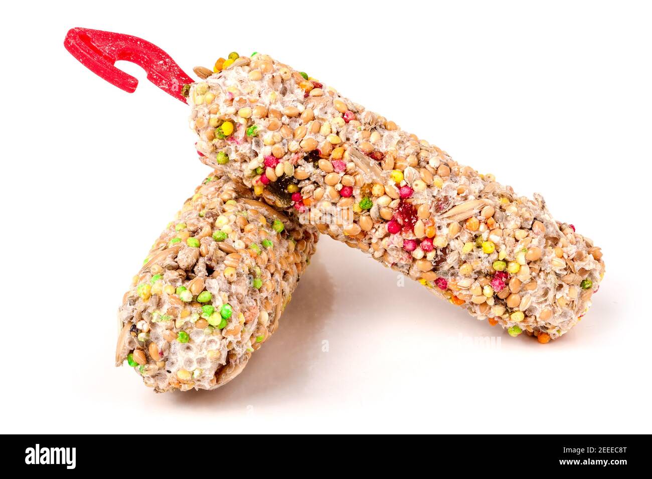 Nourriture pour perroquets isolés sur fond blanc Banque D'Images