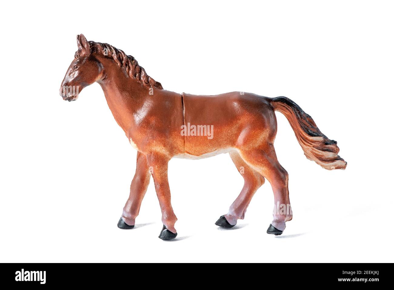 Animal de ferme. Beau jouet caoutchouc brun cheval isolé sur fond blanc Banque D'Images