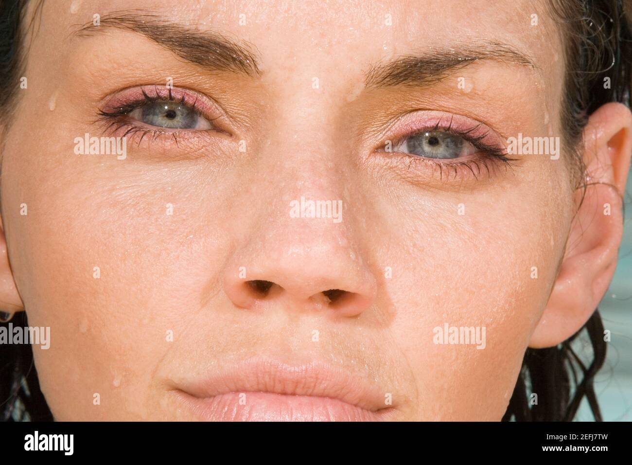 Gros plan sur le visage d'une jeune femme Banque D'Images